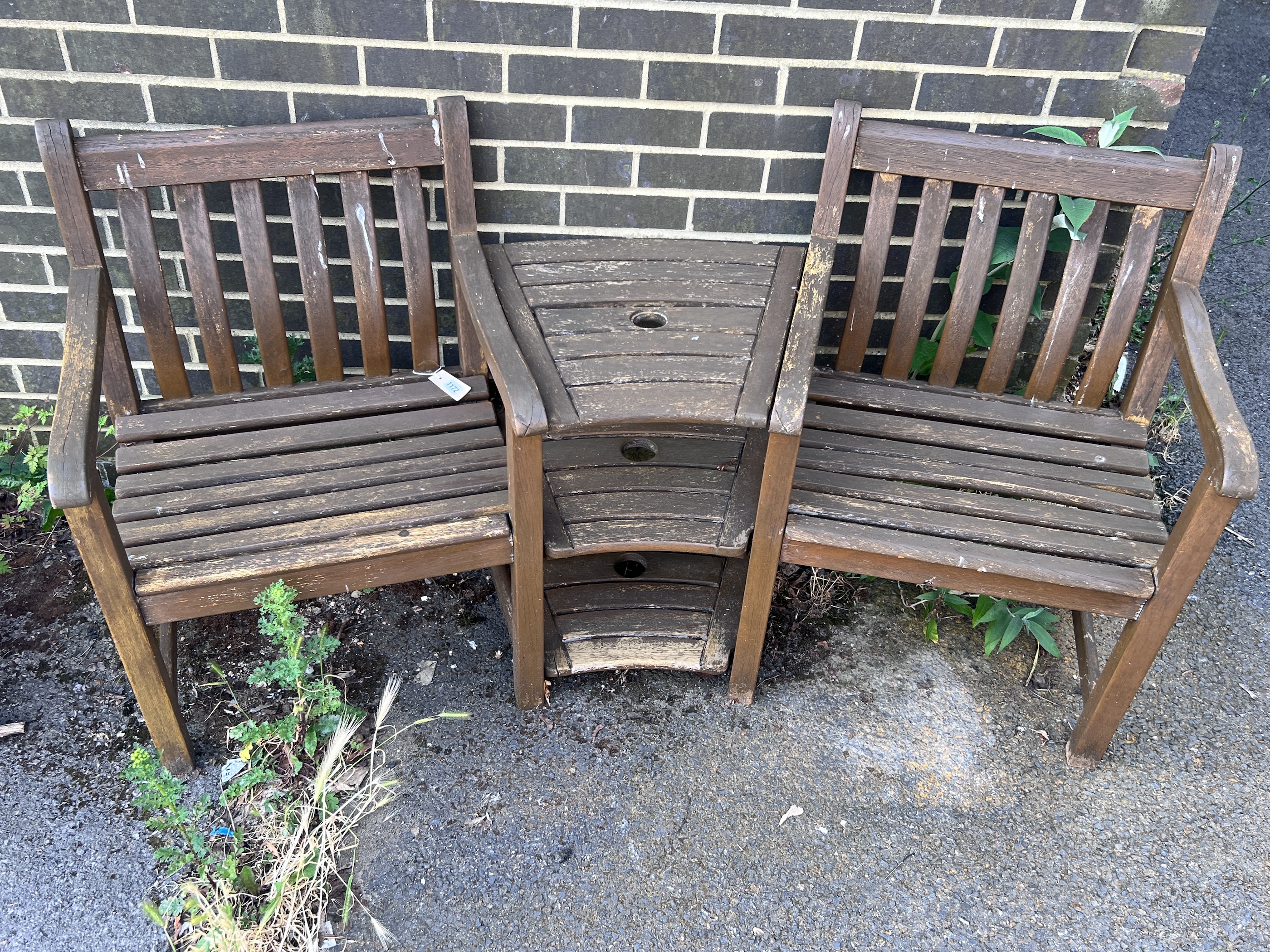 An Alexander Rose stained teak garden bench, length 180cm, depth 60cm, height 86cm